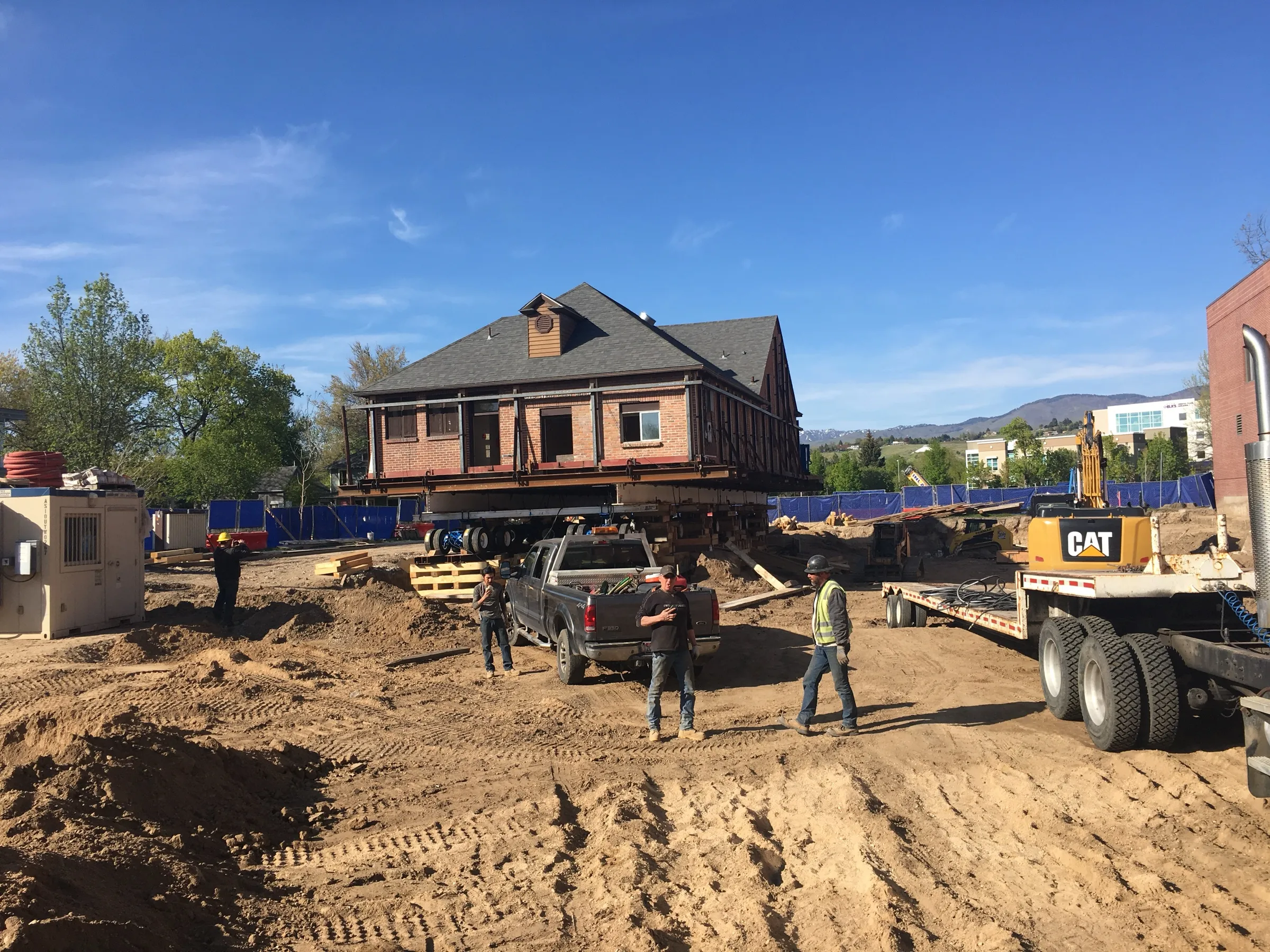 The building arriving at its prepared site