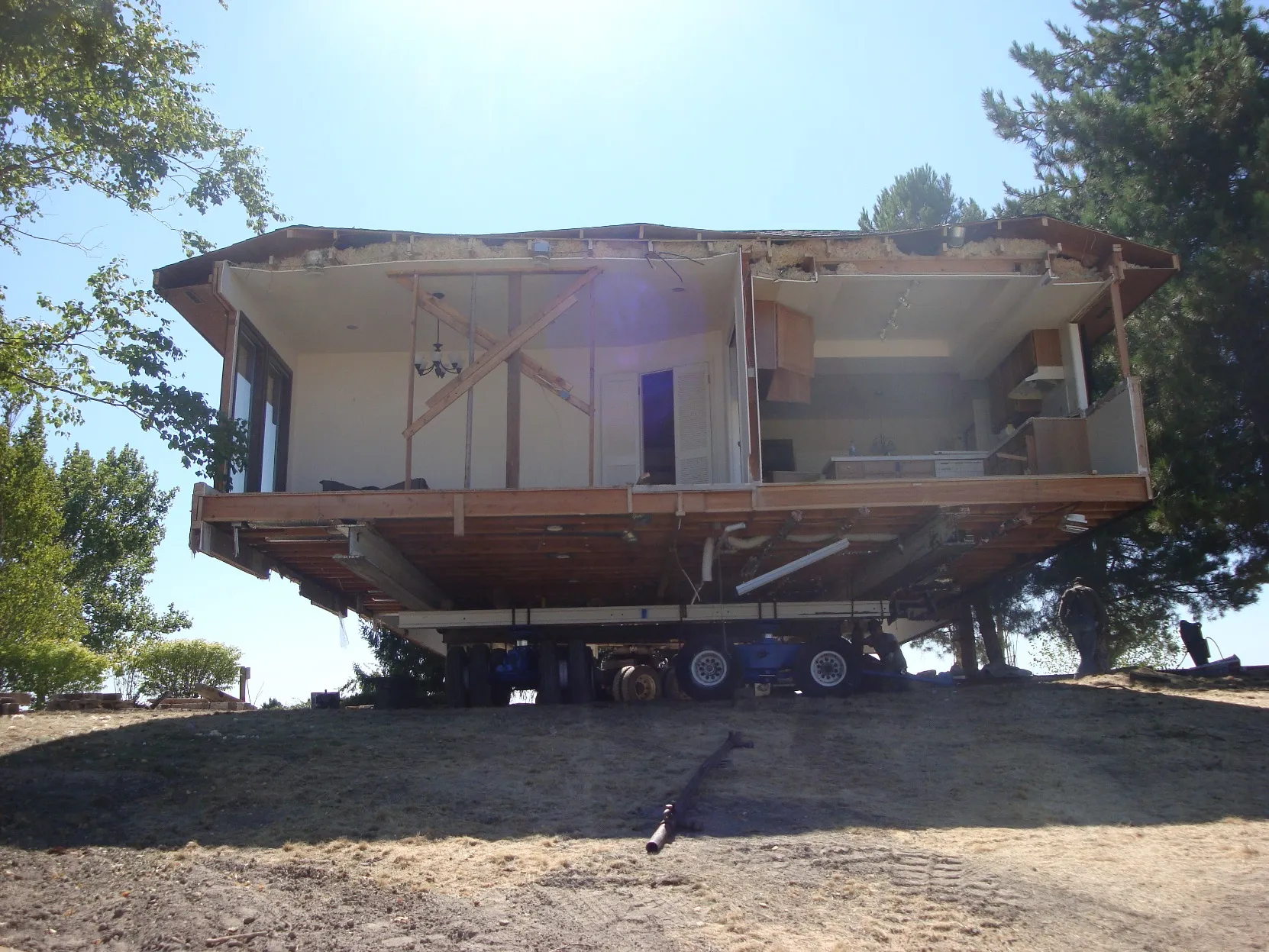 House lifted off its foundation, structure open beneath