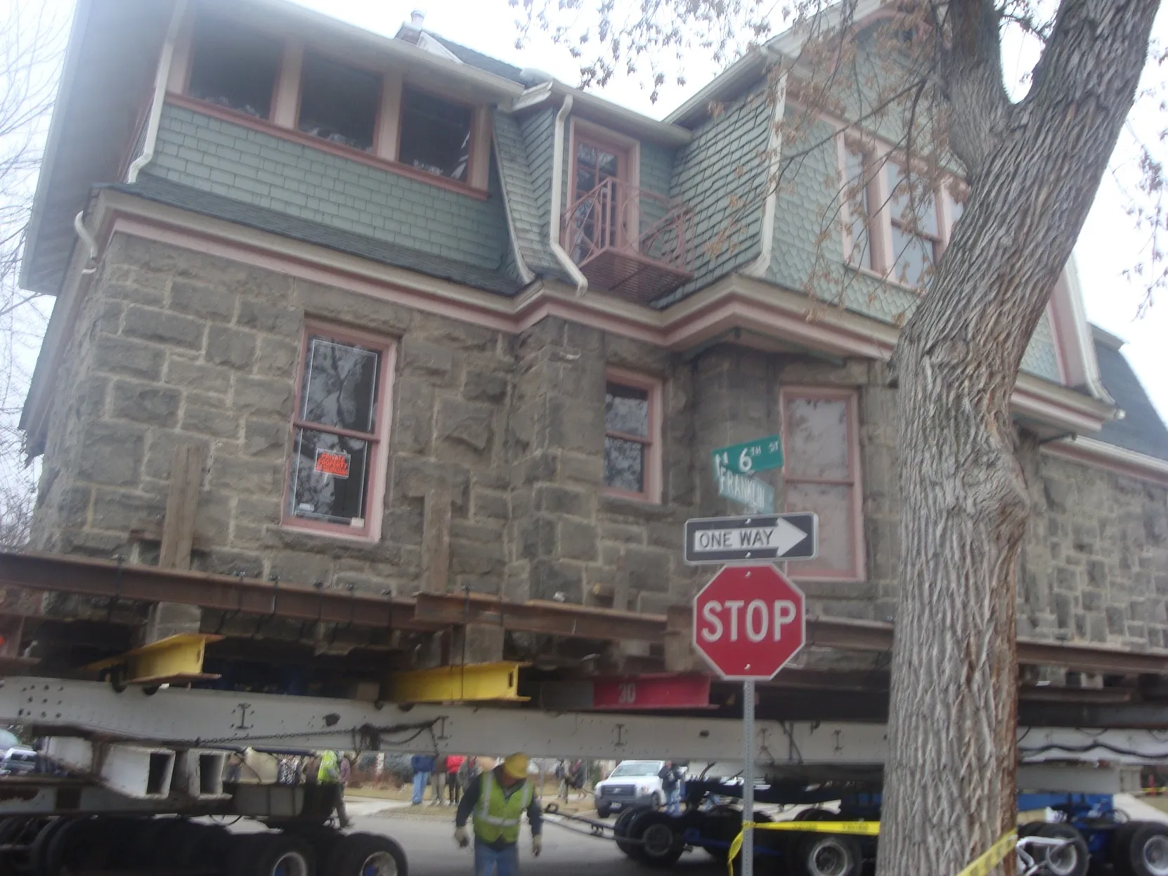 Stone school building on a trailer