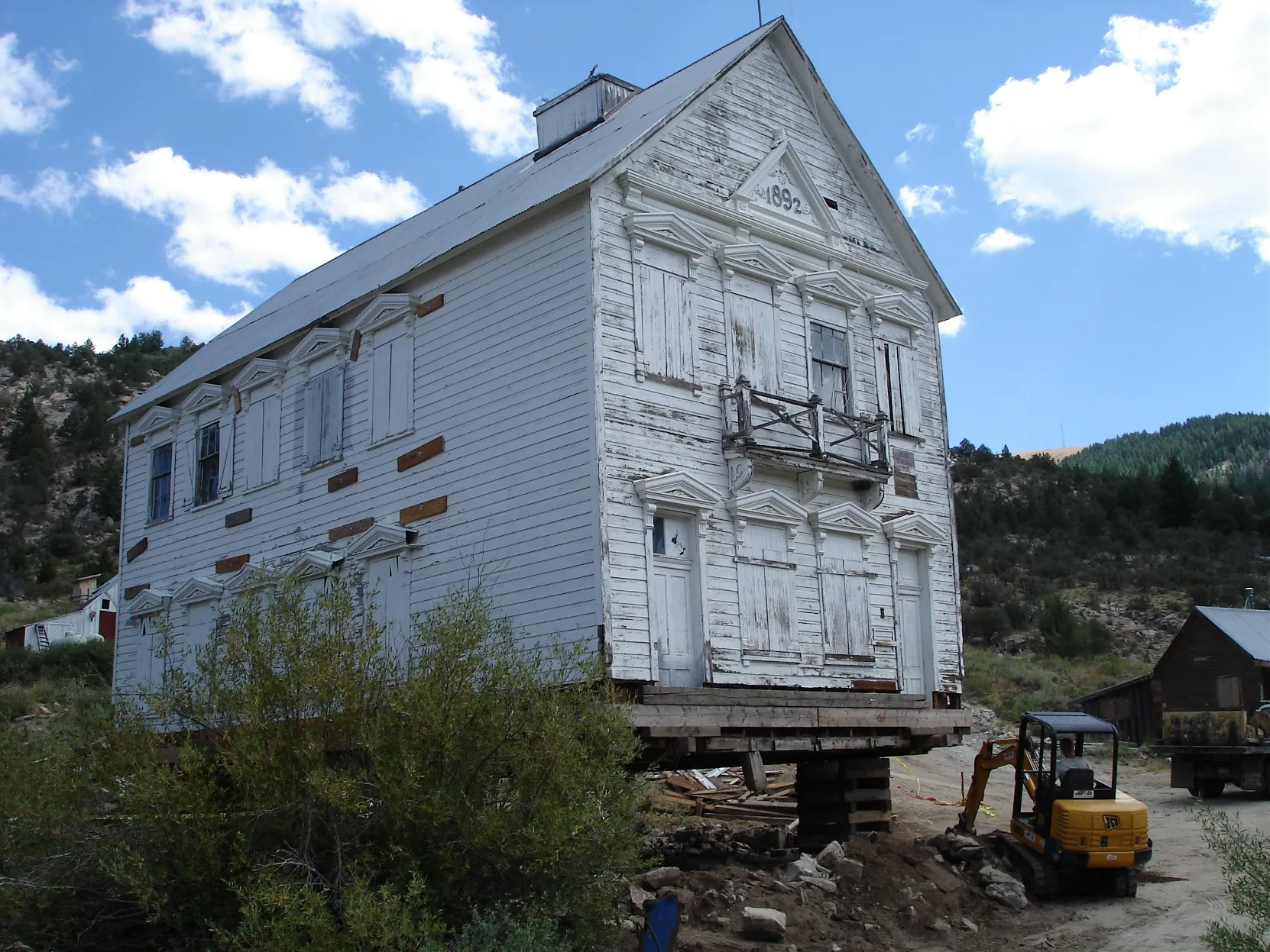 White historic house under blue sky
