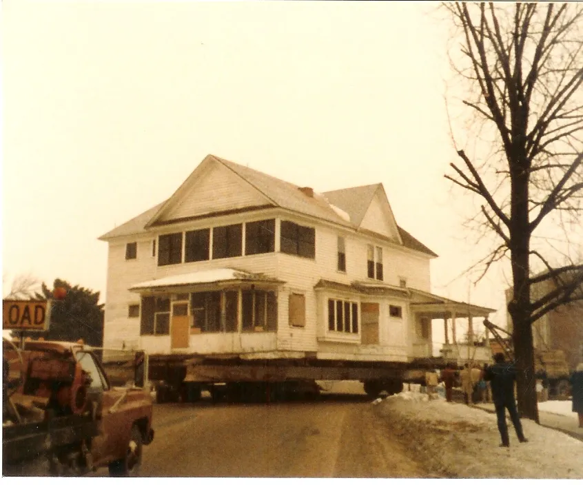 A two-story house on a truck, 1970s